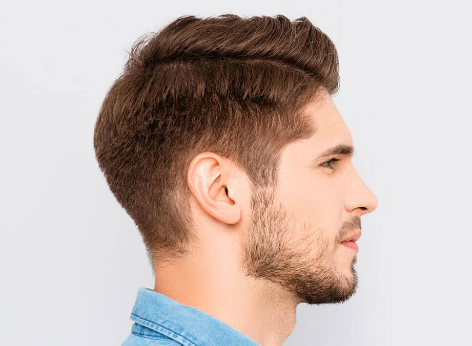 Profile of young man with beard